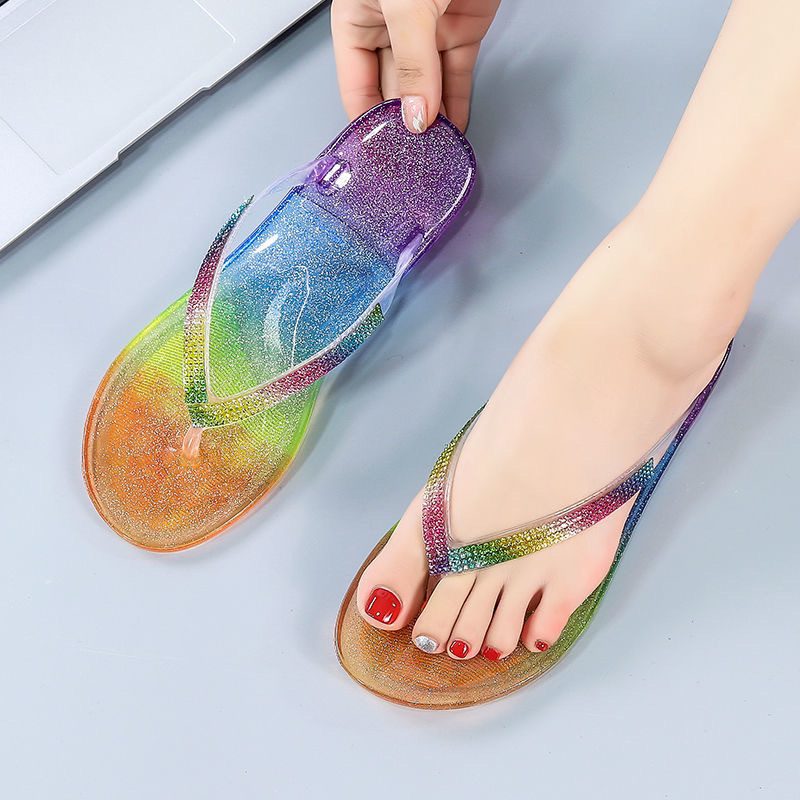 2024 Sommer Flip Flops Kvinners Nye Mote Godteri Farge Flat Krystall Klype Sandaler Tøfler Sko